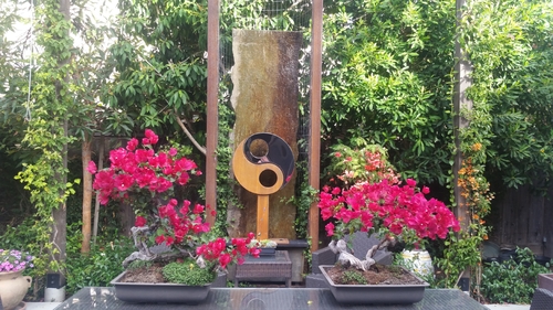 Blog perusahaan terbaru tentang Desain Patung Yin - Yang yang Menggabungkan Baja Tahan Karat dan Baja Pelapukan